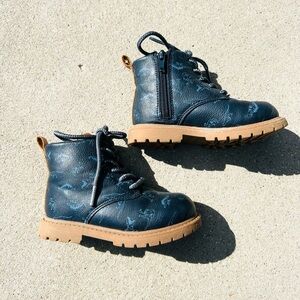 Kids blue and tan dinosaur boots.